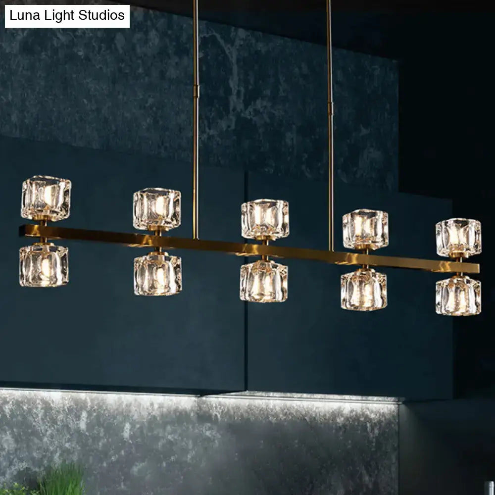 Gold-toned DecorBites ice cube crystal pendant light with six faceted cubes and bulb base for dining room island lighting