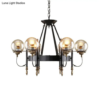 Decorbites™ industrial 6-light black wrought iron chandelier with clear glass globe amber globes and brass accents for living room