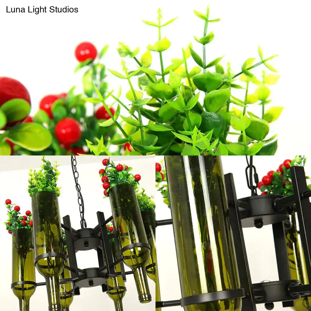 Decorbites industrial 6-light green glass wine bottle chandelier with green and red artificial plant arrangement and light bulbs