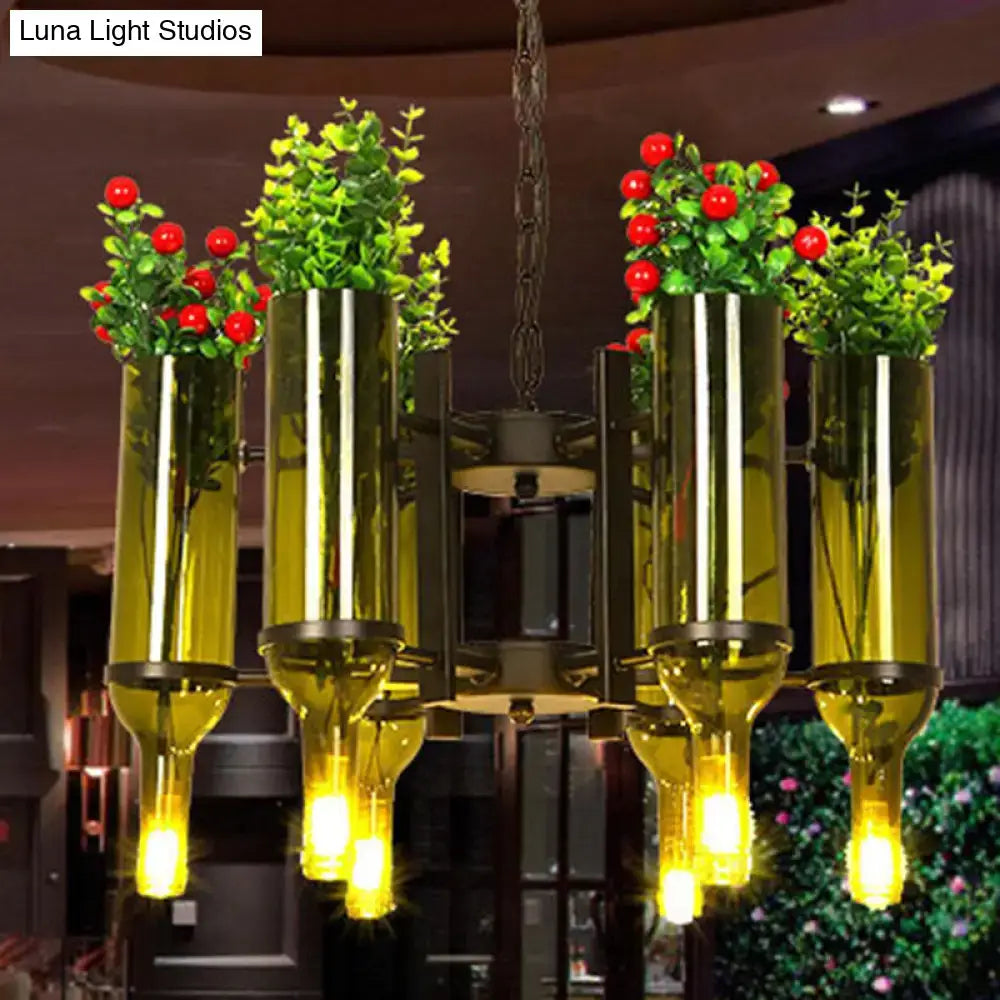 DecorBites industrial 6-light green glass wine bottle chandelier with golden light bulbs greenery and red berries