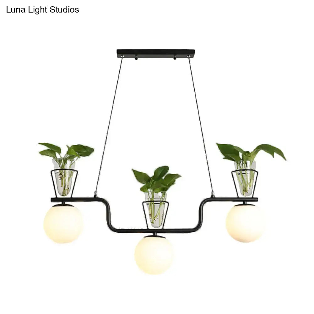 DecorBites™ industrial black island light fixture with opal glass globe pendant and clear glass pot planters
