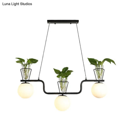 DecorBites™ industrial black island light fixture with opal glass globe pendant and clear glass pot planters