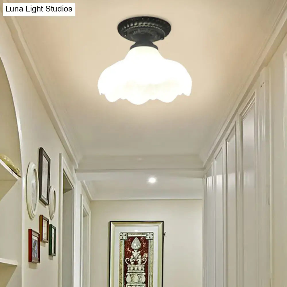 DecorBites™ industrial black semi flush ceiling light with a dome flower milky glass shade ideal for gallery lighting