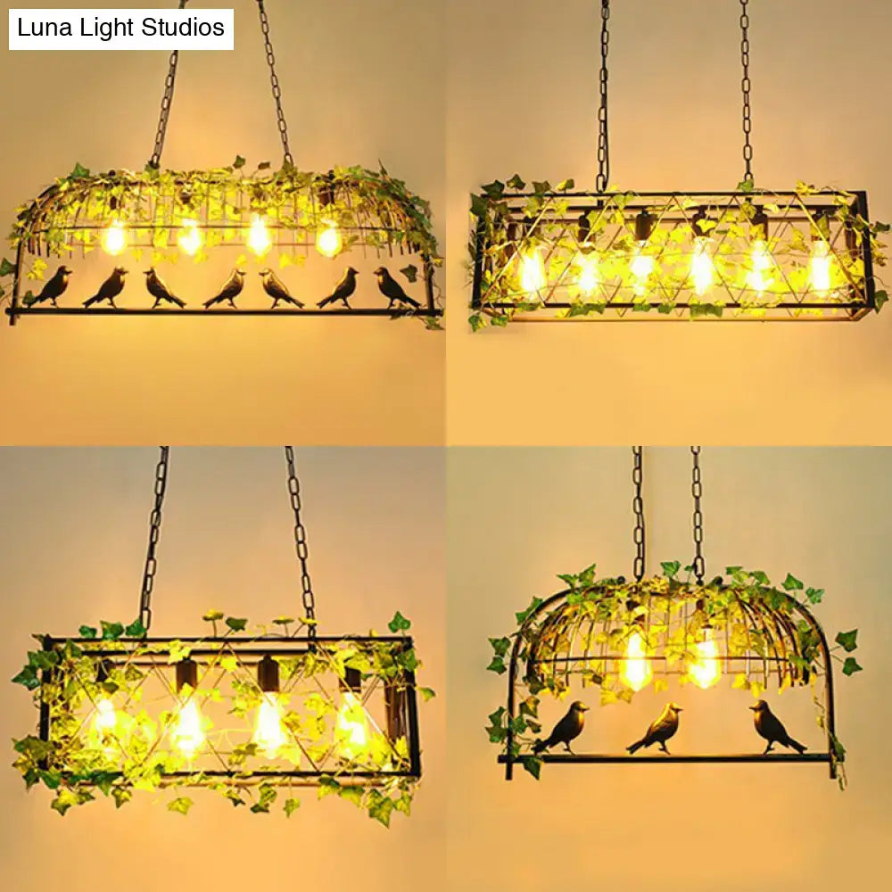 Wrought iron bird-themed pendant lights with green imitation leaf and warm yellow bulbs for dining room decor