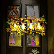 DecorBites™ industrial cage metal pendant light with exposed bulbs and green imitation leaf for dining room use
