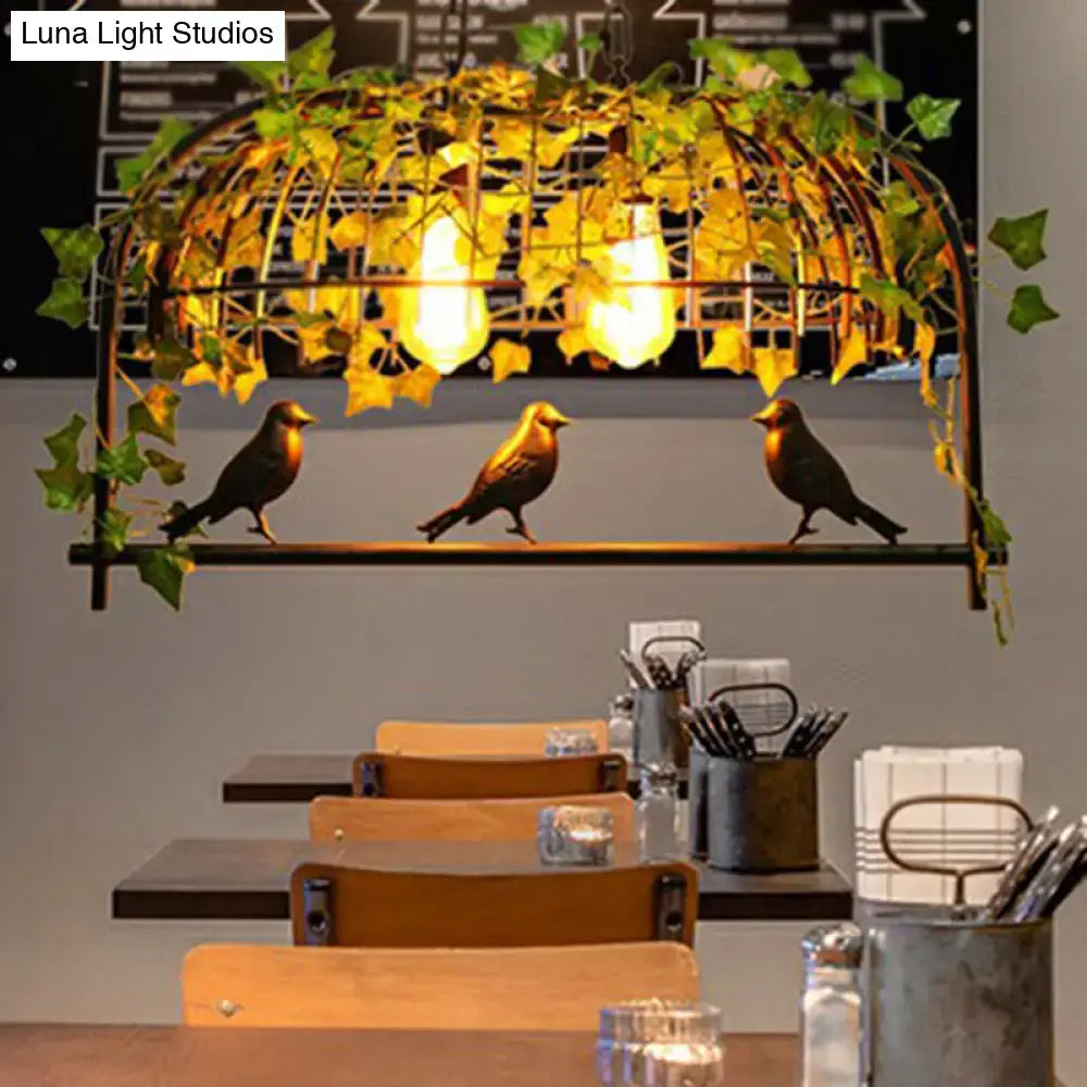 DecorBites™ industrial cage metal pendant light with golden hue, imitation leaf, and bird decor for dining room use
