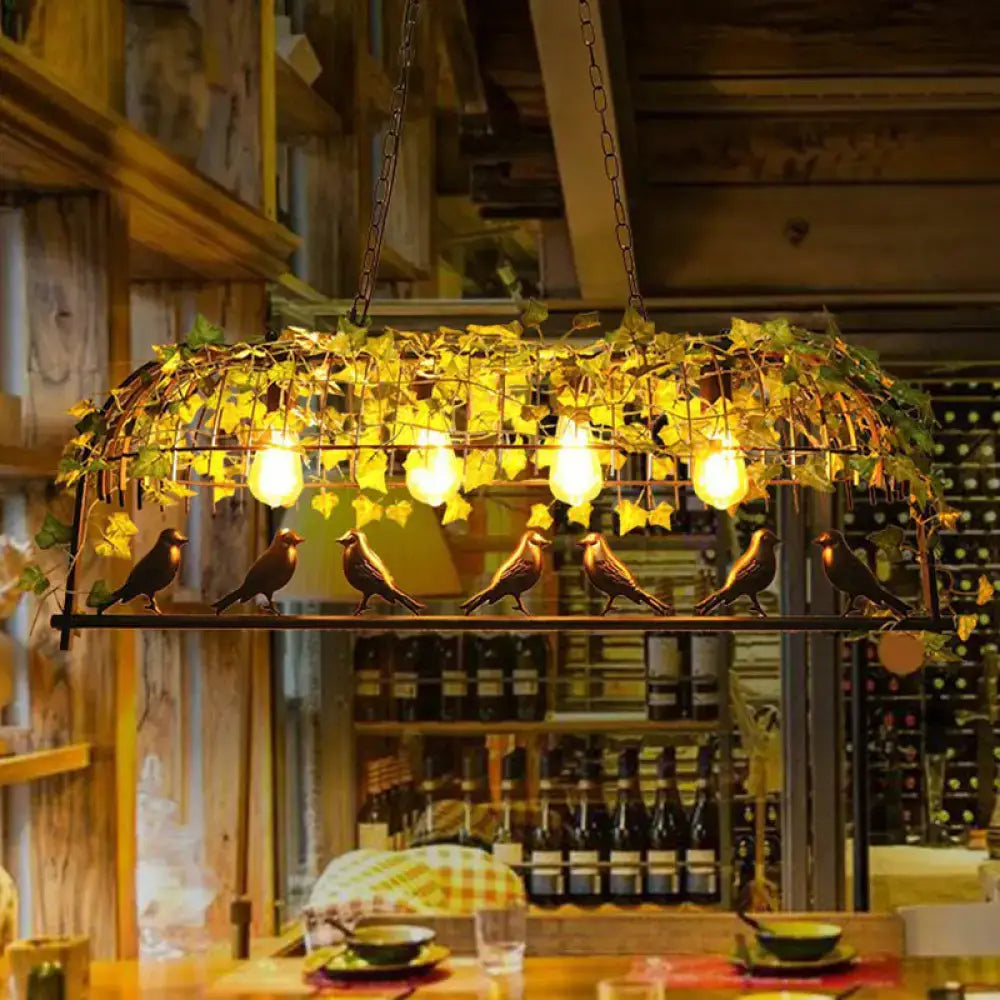 Wrought iron industrial cage pendant light with golden-brown birds and green imitation leaf for dining room use