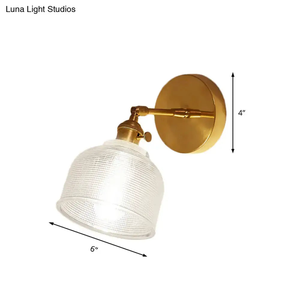 Gold-finished industrial brass wall sconce with textured translucent frosted glass dome wall shade for bedroom lighting