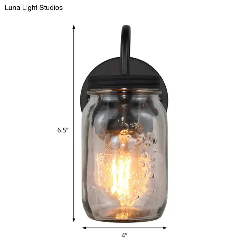 Industrial black jar shade wall lamp featuring clear glass mason jar with textured bubbles and exposed filament bulb