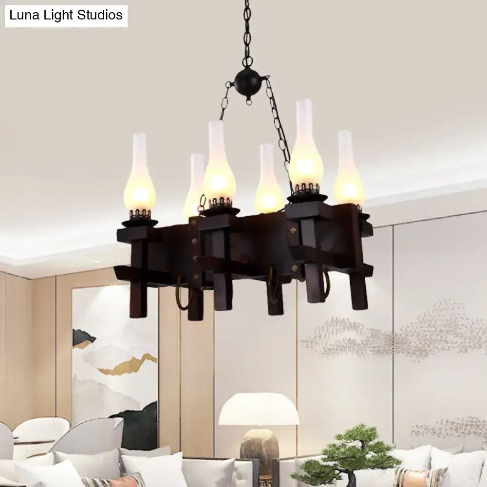 Black wrought iron DecorBites™ industrial chandelier with six frosted glass lampshades for 110v-120v or 220v-240v use