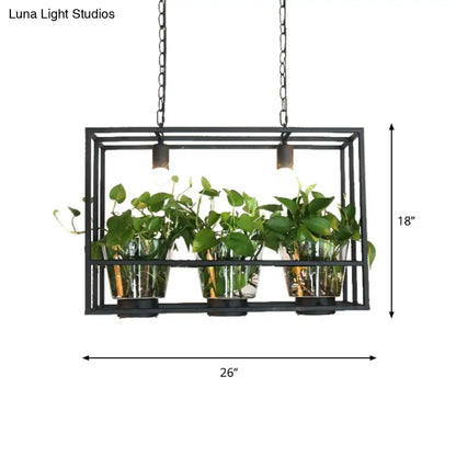 Black metal rectangular hanging planter with three clear glass plant pots holding green leafy plants in decorbites™ lamp
