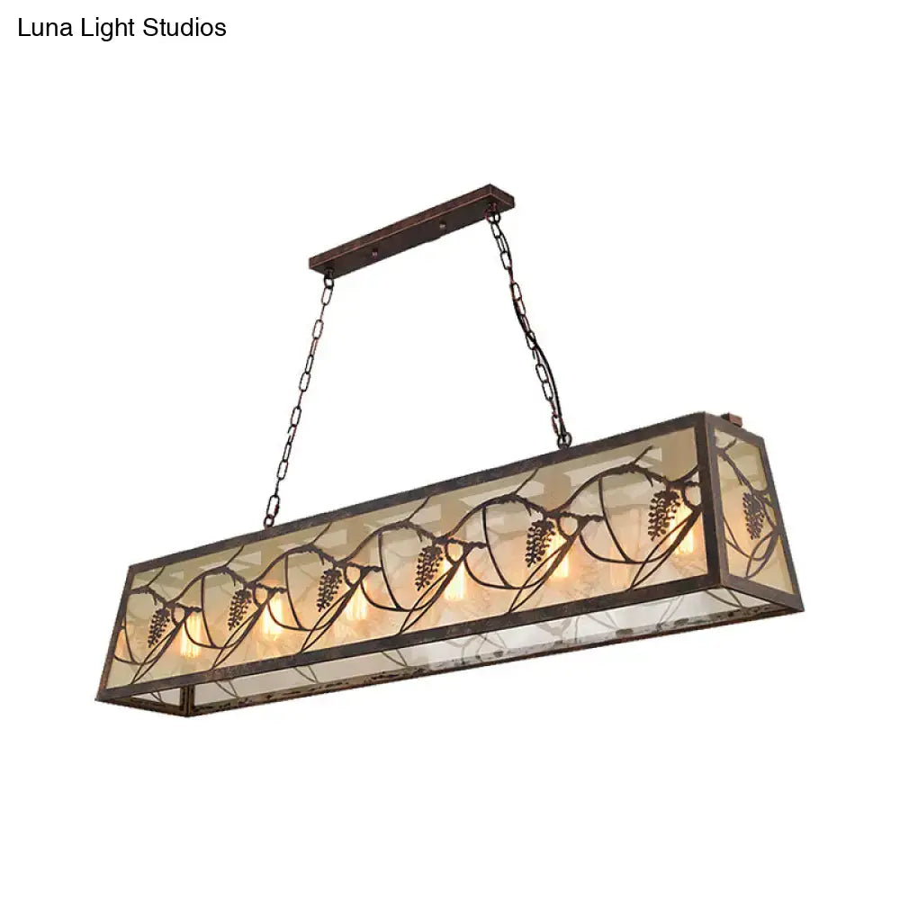 DecorBites industrial metal pendant lighting with bronze finish rectangle shade and intricate grapevine stained glass panels