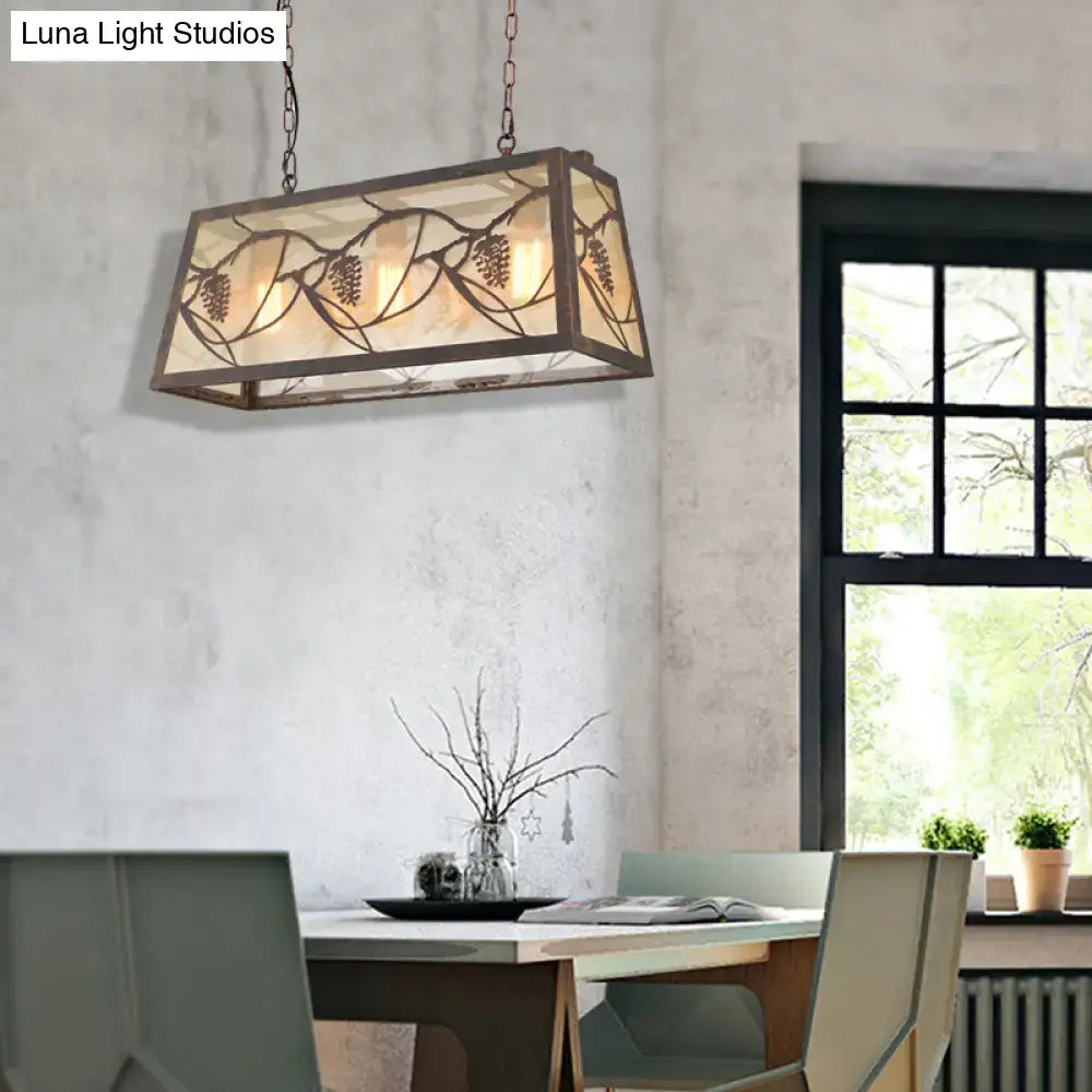 DecorBites™ industrial metal pendant lighting with rectangular shade, dark bronze frame, and pinecone cutout design