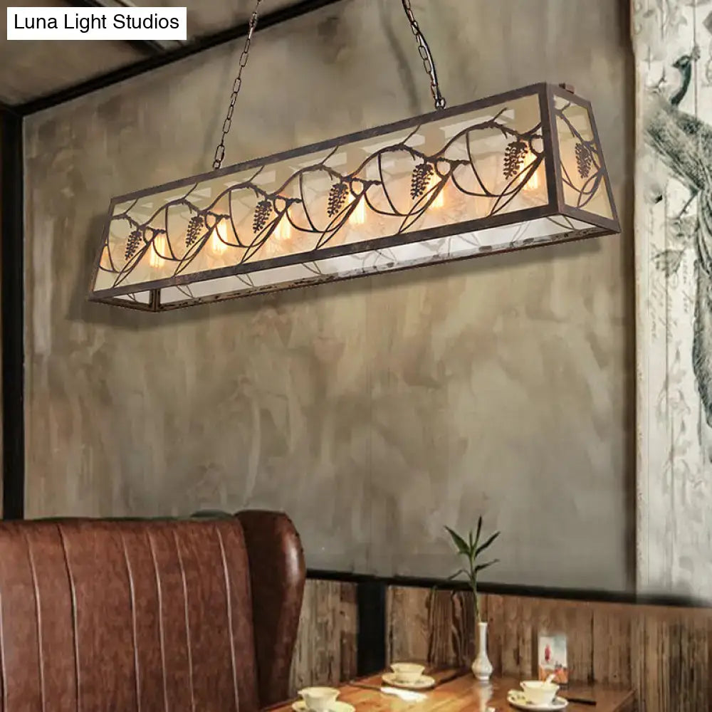 DecorBites™ industrial metal pendant lighting with rectangle shade, wrought iron, stained glass, and warm amber bulb base