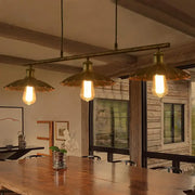 Brass decorbites™ rust scalloped suspended lighting fixture with three exposed filament bulbs and fluted shades