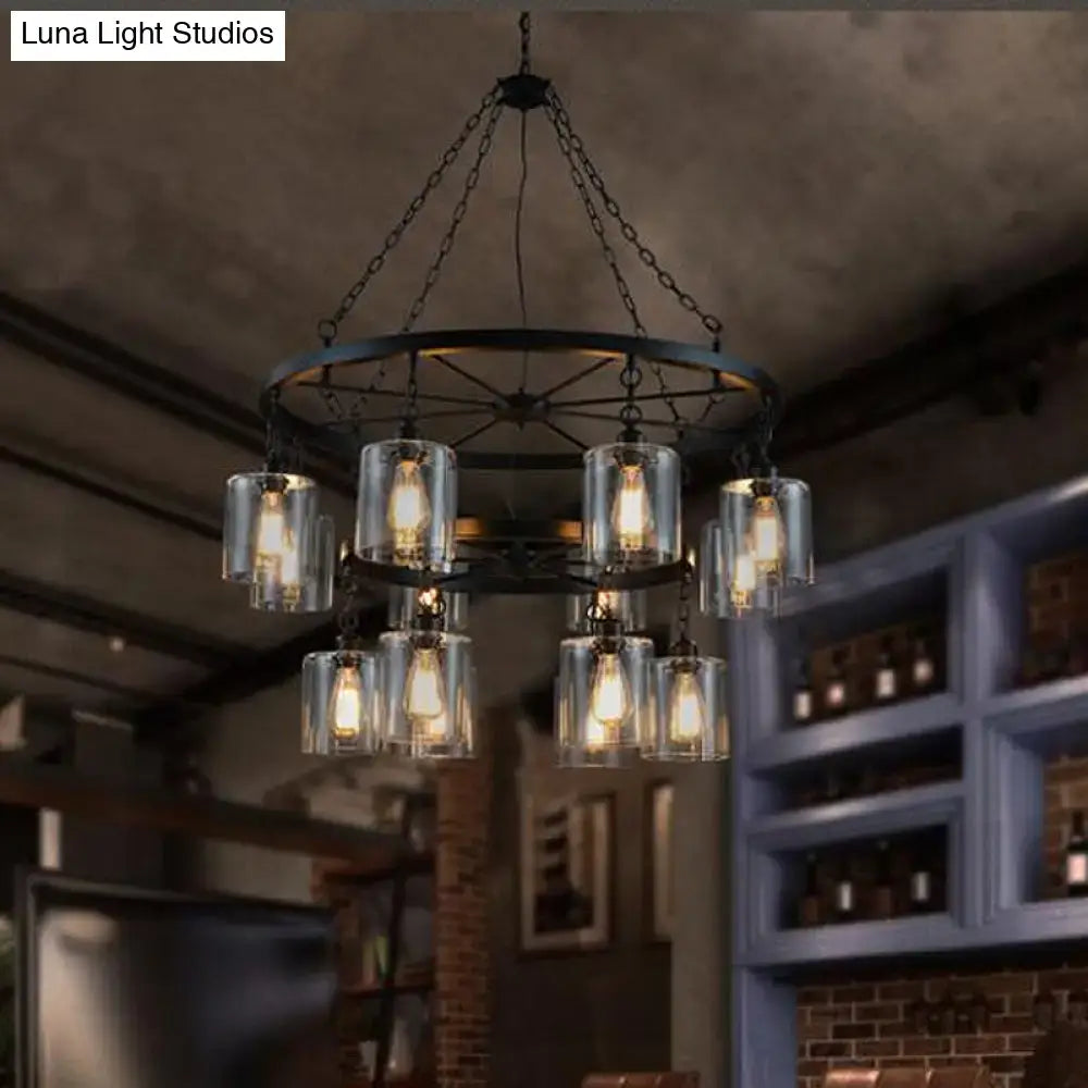 DecorBites™ industrial pendant chandelier with black metal frame, clear glass cylinder shades, and chain suspension