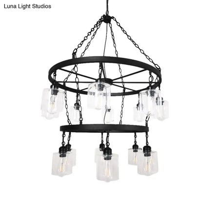Black wrought iron industrial pendant chandelier with two-tier wheel design and clear glass cylinder shades