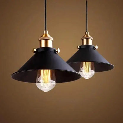 Black metal pendant light with brass accents and exposed filament bulbs from decorbites industrial pendant lighting