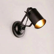 Black industrial-style DecorBites™ aleah wall sconce with matte finish and gold-lined interior for elegant lighting