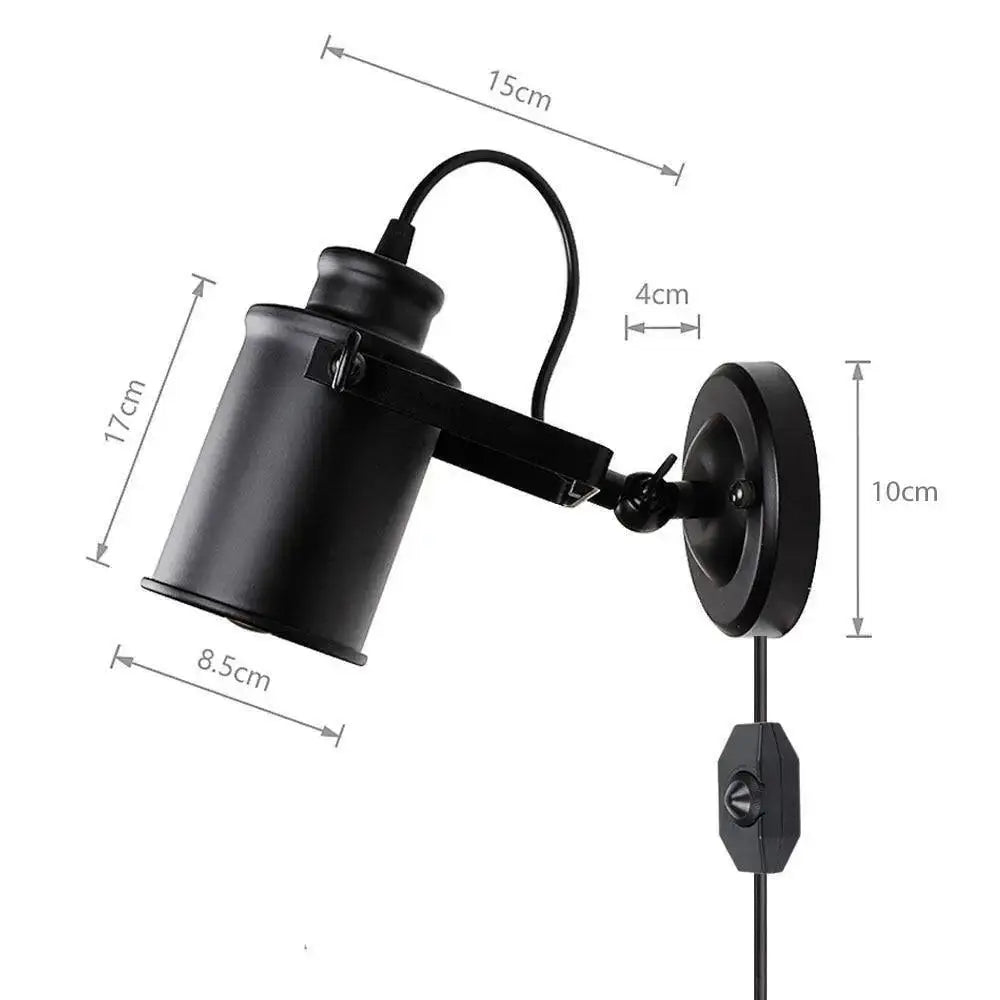 Black industrial-style decorbites™ aleah wall sconce with adjustable arm and switch for versatile lighting