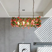 DecorBites industrial rectangular brass pendant light with metal construction and pink rose accents for bedroom use