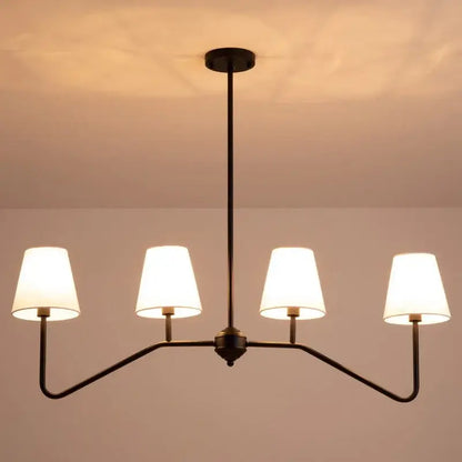 Modern black metal industrial style chandelier by decorbites with four white fabric shades for living room lighting
