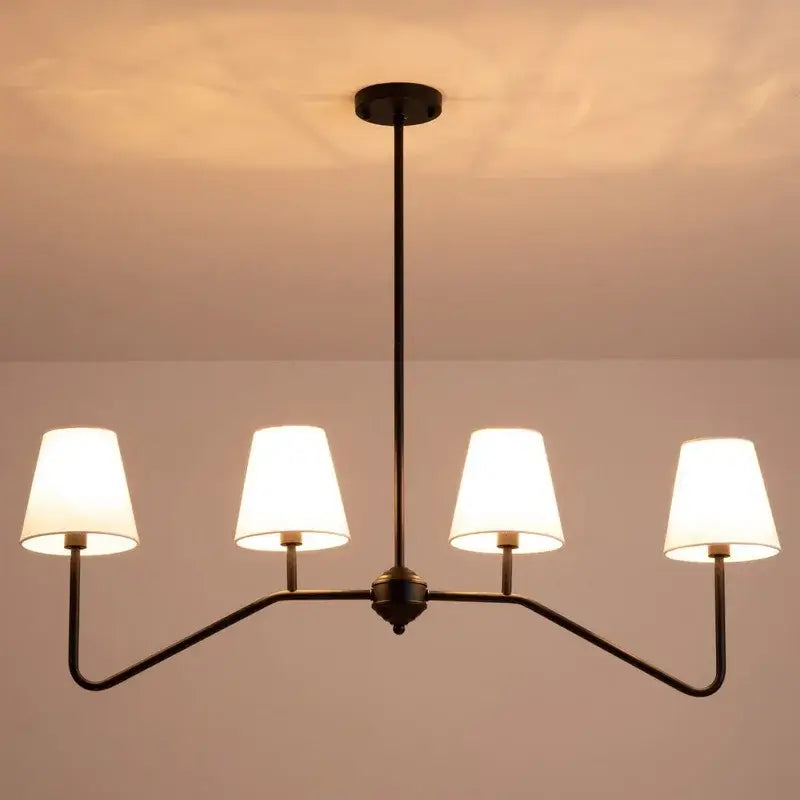 Modern black metal industrial style chandelier by decorbites with four white fabric shades for living room lighting