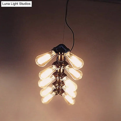 DecorBites™ industrial style ceiling light features black metal piping and brass pendant light fixture with Edison bulbs