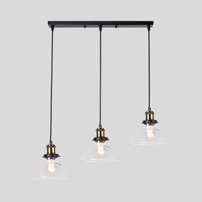 Black metal industrial style brass pendant light kit with three clear glass round barn admix hanging lamps