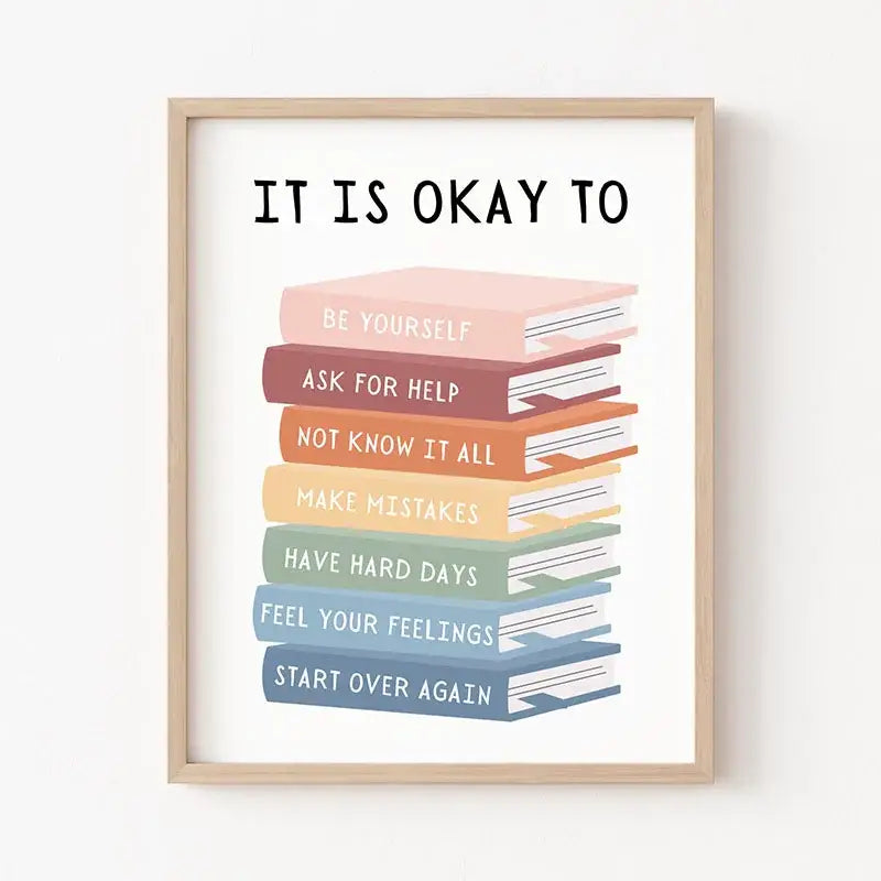 A framed decorbites™ inspirational quote poster featuring a stack of pastel illustrated books with encouraging phrases