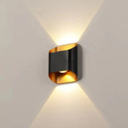 Decorbites™ ip65 modern black and gold led outdoor wall lights with sleek curved design casting warm light beams