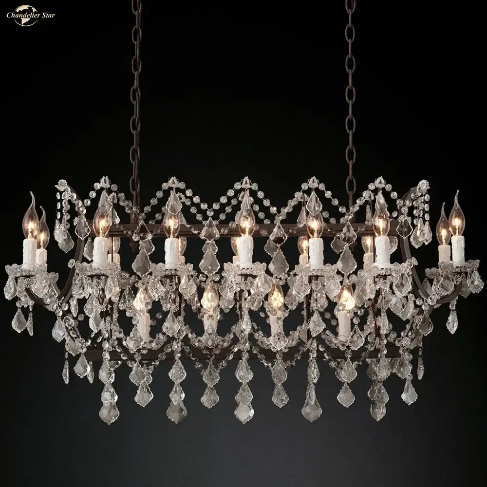 A decorbites iron crystal led chandelier with a dark metal frame and cascading clear crystals for kitchen lighting