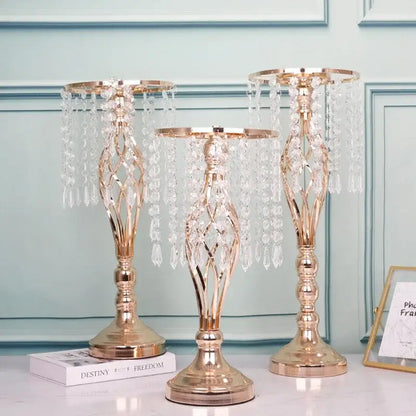 Three elegant rose gold crystal chandeliers complement iron flower racks for dining table decoration by decorbites