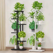 Decorbites™ iron plant stand in black and white metal with multiple tiers holding green plants in white ceramic pots