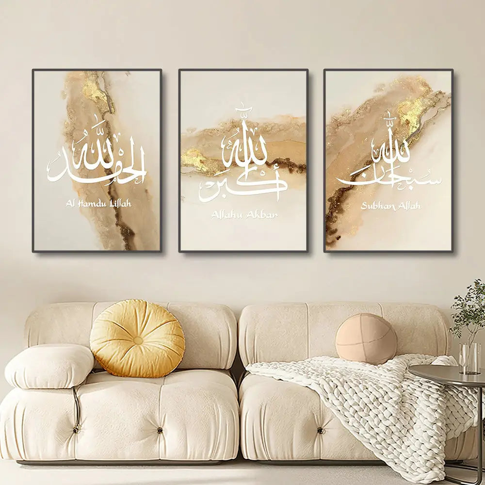 Three framed decorbites™ ayatul kursi wall art pieces with white arabic calligraphy on gold and beige abstract backgrounds