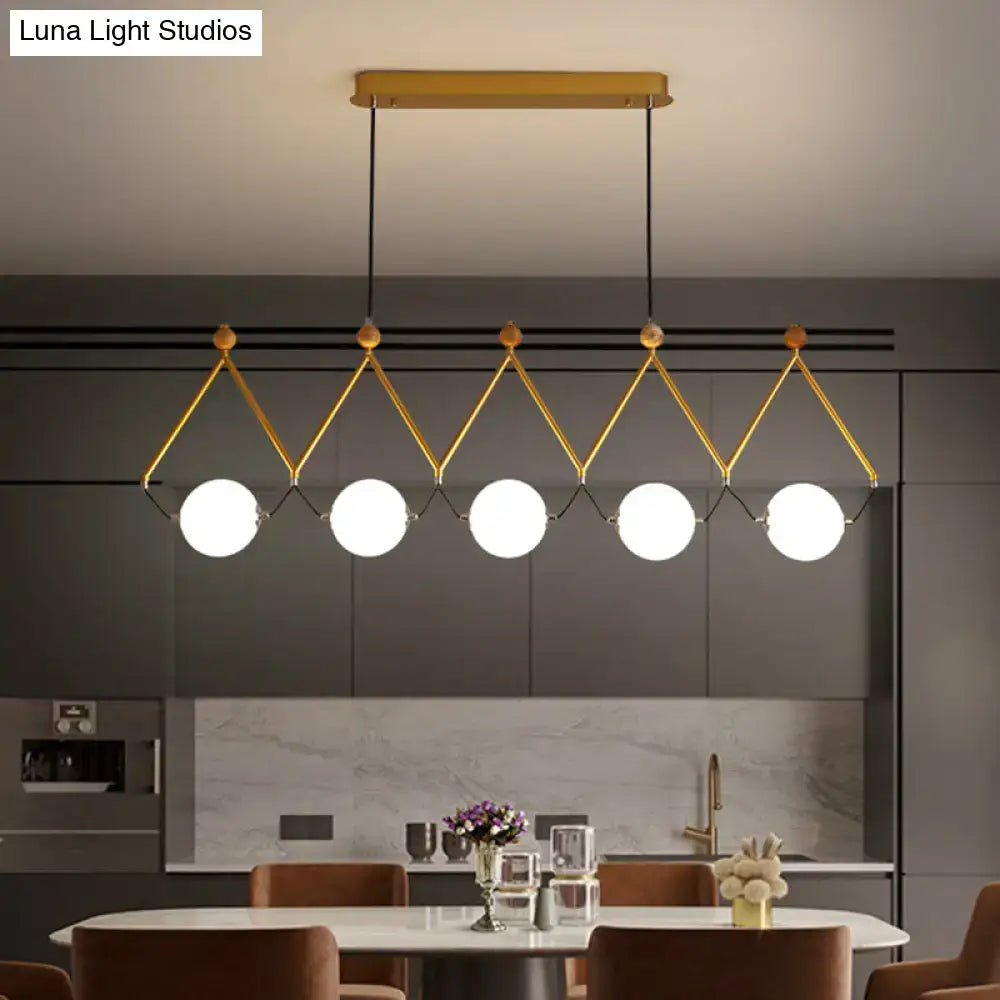 Decorbites ivory glass minimalist ball suspension light with gold-toned geometric frame and white glass bulbs suspension light