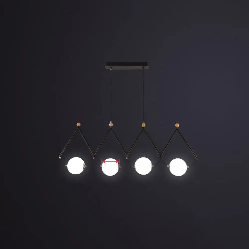 Modern black metal DecorBites™ suspension light with four glowing white ivory glass balls and wooden accents ideal for restaurant suspension light