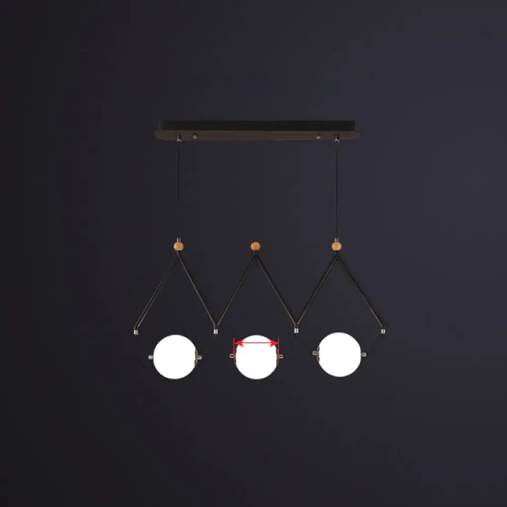 DecorBites™ ivory glass minimalist ball suspension light with black metal, frosted globes, wooden accents, ideal for restaurant suspension light