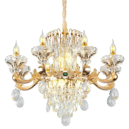 Gold-toned decorbites jade crystal chandelier with intricate crystal droplets and a central green gemstone accent