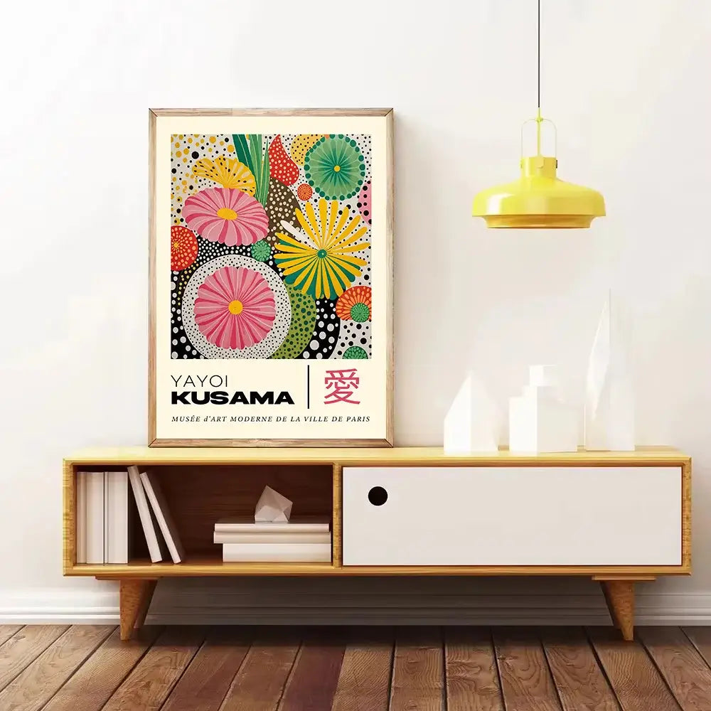 A vibrant DecorBites™ canvas art featuring yayoi kusama pink and green floral patterns with a geometric mountain landscape