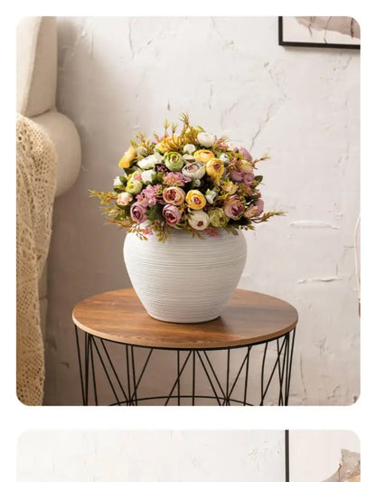 DecorBites™ japanese minimalist hydroponic vase set features a white ceramic ribbed vase with pastel artificial flowers