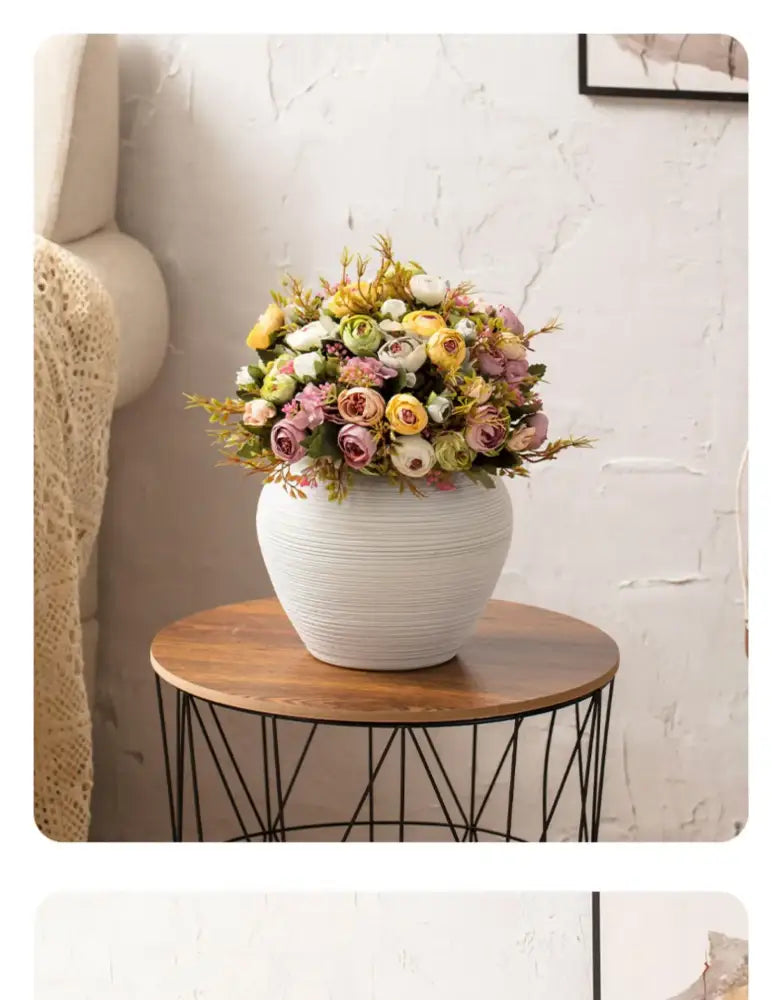 DecorBites™ japanese minimalist hydroponic vase set features a white ceramic ribbed vase with pastel artificial flowers