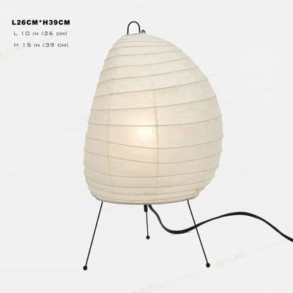 Cream-colored decorbites japanese style paper floor lamp with black metal tripod base for living room lighting