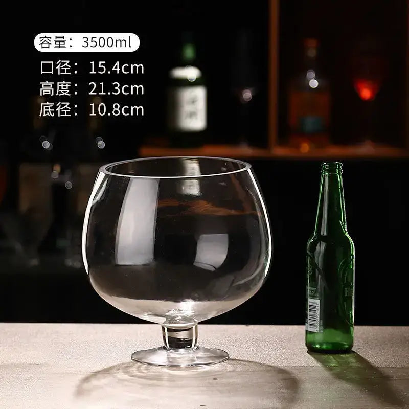 Clear glass decanter with wide rounded bowl and short stem for decorbites jumbo party jumbo party glasses use