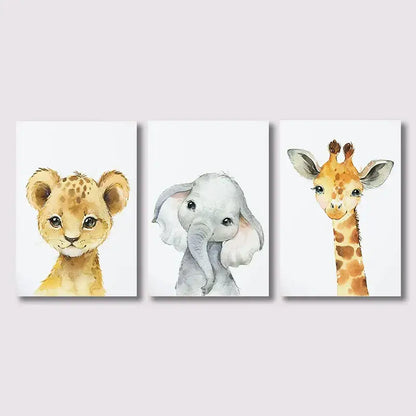 Set of three DecorBites™ jungle animal nursery wall art prints featuring lion cub, elephant, and giraffe on white backgrounds