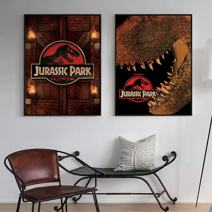 Two framed jurassic park dinosaur canvas posters featuring the iconic logo with flames and a t-rex close-up