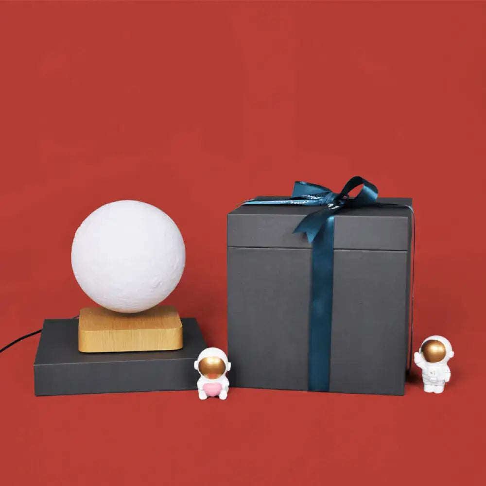 DecorBites™ kids moon sphere maglev table lamp in white plastic with wooden base features LED light type and standard bulb base