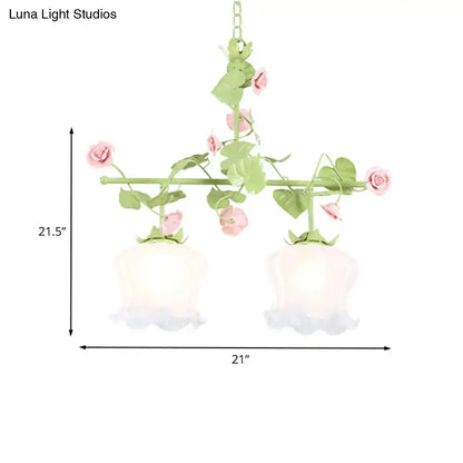 Pastel pink and green floral korean garden hanging light fixture with two frosted white glass shades and bulb base details