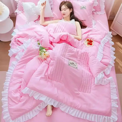 Pink ruffled summer quilt set with white lace trim and subtle embroidered label from decorbites korean princess ruffles collection