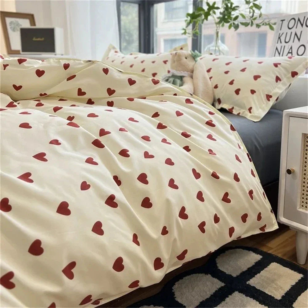 Cream-colored Korean style duvet cover with scattered red heart patterns from DecorBites bedding set collection